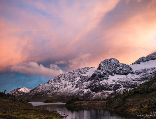 When the last sun kisses the clouds over spectacular mountain views, Alpine Lake, BC, Canada